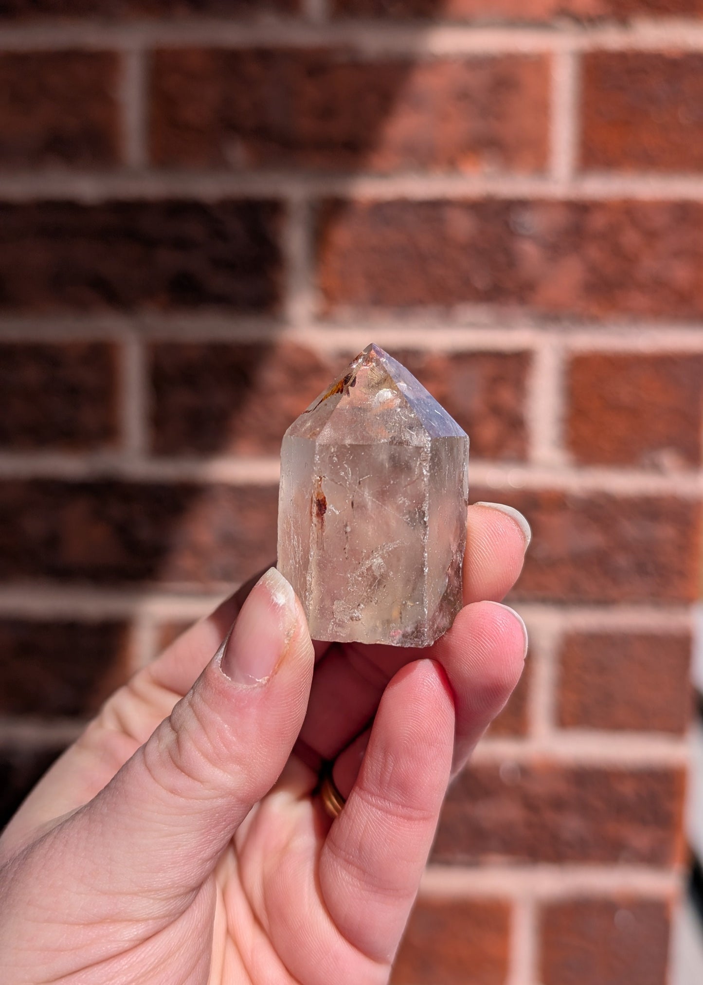 Tour de quartz inclusion de Hématite